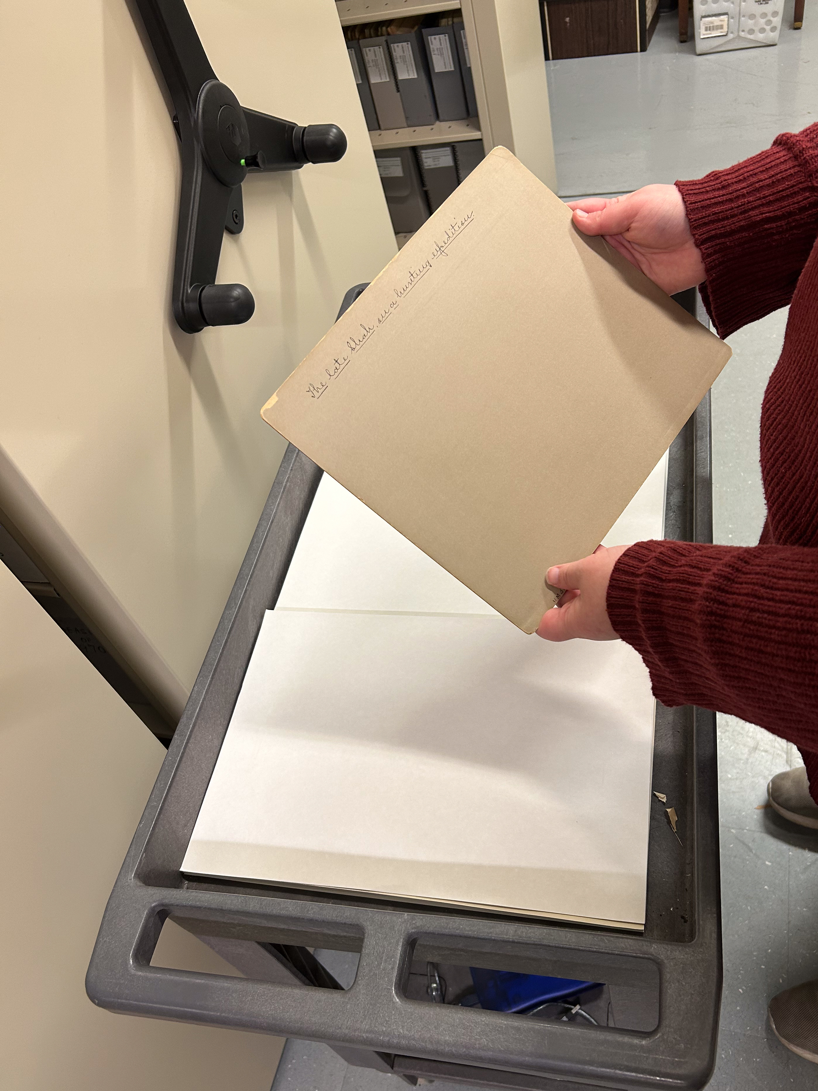 Megan Sands working with the photographs of Sevruguin